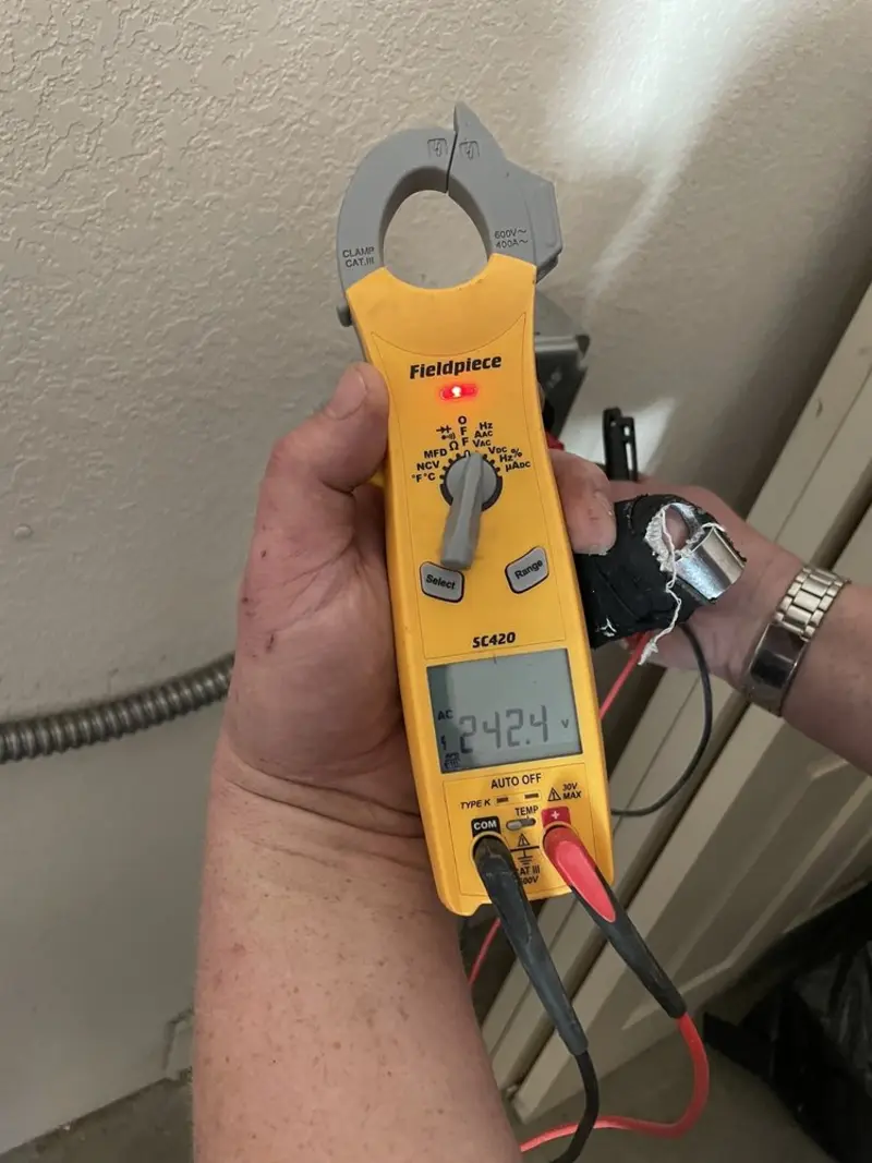 Voltage testing with clamp meter during Aluminum Wiring Replacement in Morrilton